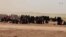 IS Wives Evacuating Syria's Baghuz Speak to VOA