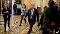 FILE - Sen. Lindsey Graham, a South Carolina Republican, walks to a meeting with Senate Republicans on Capitol Hill in Washington, Jan. 10, 2019.