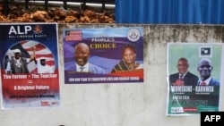 Picture in Monrovia shows campaign posters on a wall as the campaign kicks off for the presidency and House of Representatives elections in October.