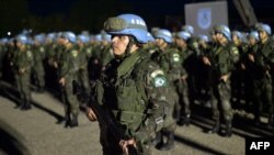 Des militaires brésiliens de la Mission des Nations Unies pour la stabilisation en Haïti (MINUSTAH) lors de la passation de commandement du 25º contingent militaire brésilien au 26º, à Port-au-Prince, le 2 juin 2017