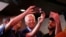 Democratic presidential candidate and former Vice President Joe Biden takes selfies with customers at Roscoe's Chicken and Waffles as he campaigns before his evening rally on Super Tuesday in Los Angeles, Calif., March 3, 2020.