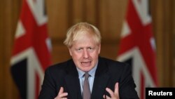 Britain's Prime Minister Boris Johnson speaks during a virtual news conference at Downing Street, London, Sept. 9, 2020. 