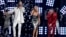 FILE - Tyler Hubbard, right, and Brian Kelley, left, of Florida Georgia Line, and Bebe Rexha, center, perform "Meant to Be" at the 53rd annual Academy of Country Music Awards in Las Vegas, April 15, 2018.