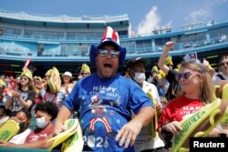 People celebrate Independence Day at the Nathan's Famous Fourth of July Hot Dog-Eating Contest held at Maimonides Park in Brooklyn, New York City, July 4, 2021.