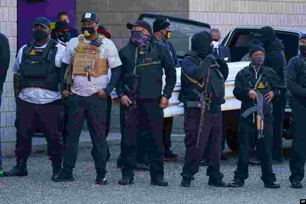 Daunte Wright&#39;s casket is removed from the hearse for funeral services at Shiloh Temple International Ministries in Minneapolis. The 20-year-old Wright was killed by then-Brooklyn Center police officer Kim Potter during a traffic stop on April 11.