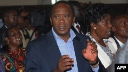 Kenya's President-elect Uhuru Kenyatta attends a church service Mar. 31, 2013 at St Austin catholic church in Lavingtone, Nairobi.