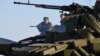 Ukraine Steps Up Mobilization, Warns of Russian Aggression
