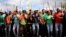 Mine workers gather at Wonderkop stadium outside the Lonmin mine in Rustenburg, northwest of Johannesburg, Jan. 29, 2014. 