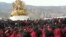 FILE - Tibetan monks gather March 14, 2012. 