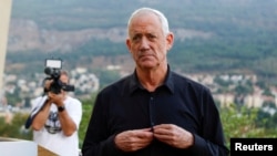 FILE— Israeli Emergency cabinet minister and opposition politician Benny Gantz addresses the press in Kiryat Shmona, Israel November 14, 2023. 