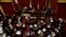 FILE - Lawmakers debate a deal with a group of U.S. creditors to put an end to a years-long dispute that kept the South American nation on the margins of international credit markets, in Buenos Aires, Argentina, March 30, 2016.
