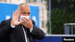 FILE - Bulgaria's then-prime minister Boyko Borissov arrives for the second day of a European Union leaders summit in Brussels, Oct. 2, 2020. 