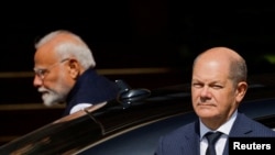 German Chancellor Olaf Scholz and India's Prime Minister Narendra Modi arrive at Hyderabad House in New Delhi, India Oct. 25, 2024