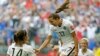 United States&#39; Tobin Heath, center, celebrates with Morgan Brian, left, after Heath scored a goal against Japan during the second half of the FIFA Women&#39;s World Cup soccer championship in Vancouver, British Columbia, Canada, July 5, 2015.