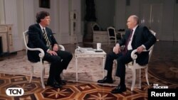 Russian President Vladimir Putin speaks during an interview with U.S. television host Tucker Carlson, in Moscow, February 6, 2024.
(Tucker Carlson Network/Handout via REUTERS)