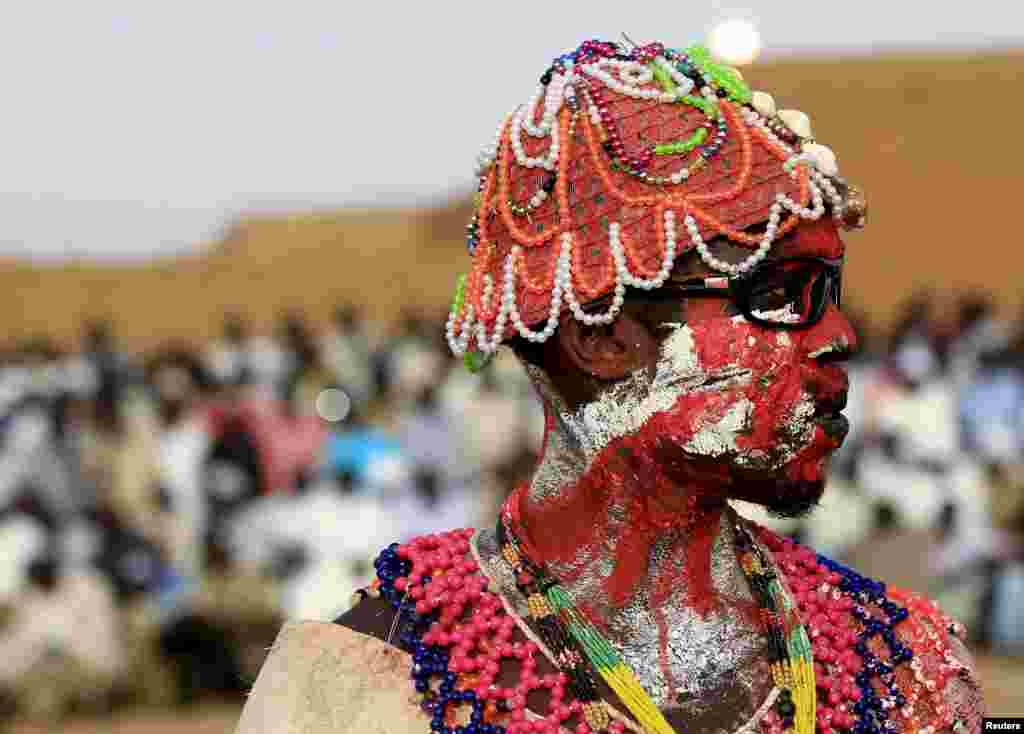 A wrestler from the Nuba Mountains tribe participates in a celebration of their cultural heritage, as part of ongoing events to commemorate the International Day of the World&#39;s Indigenous Peoples, in Omdurman, Sudan, Aug. 15, 2015.