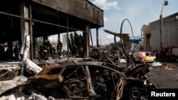 Последствия ракетного удара РФ по г. Винница, Украина, 14 июля 2022 г. (фото REUTERS/Valentyn Ogirenko) 