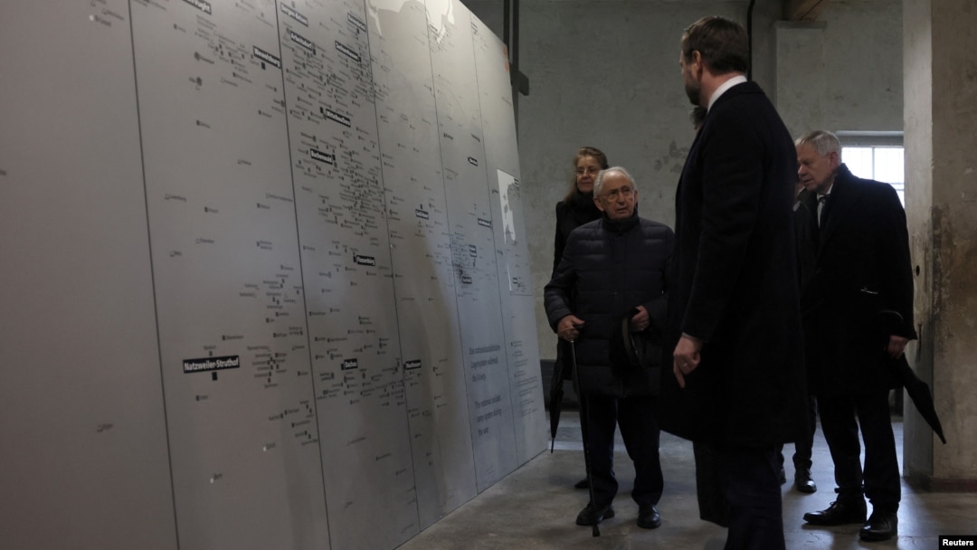 U.S Vice President JD Vance speaks with Abba Naor, a Holocaust survivor who was held at Dachau, at the Dachau Concentration Camp Memorial Site in Dachau, Germany, Feb. 13, 2025.