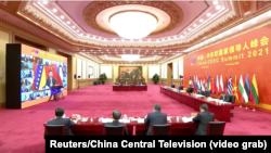 Chinese leader Xi Jinping and other officials at the virtual China-CEEC summit on February 9