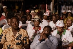 Supporters of presidential candidate Domingos Simoes Pereira (DSP) from the traditional ruling African Party for the Independence of Guinea-Bissau and Cape Verde (PAIGC) attend a rally at Nino Correa stadium in Bissau, on Dec. 27, 2019.