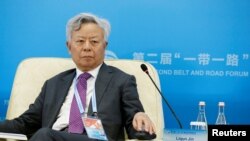 FILE - Asian Infrastructure Investment Bank (AIIB) president Jin Liqun attends a thematic forum of the second Belt and Road Forum for international cooperation in Beijing, China, April 25, 2019.