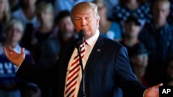 Republican presidential candidate Donald Trump speaks at a campaign rally, Oct. 18, 2016.