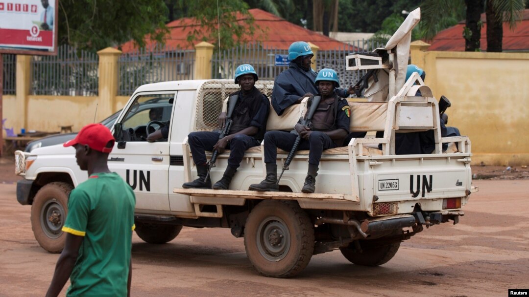 FILE - U.N. peacekeepers ride a pickup truck while on patrol in Bangui, Central African Republic, April 24, 2017, amid fears over rising ethnic tensions in the country.
