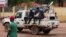 FILE - U.N. peacekeepers ride a pickup truck while on patrol in Bangui, Central African Republic, April 24, 2017, amid fears over rising ethnic tensions in the country.