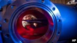 In this Jan. 31, 2019, image provided by the U.S. Air Force Academy, Cadet 2nd Class Eric Hembling uses a Ludwieg Tube to measure the pressures, temperatures, and flow field.