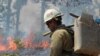 A member of the Monterey Hotshots carries a gas can near a burn operation on the southern flank of the Rim Fire near Yosemite National Park in California, August 30, 2013. (U.S. Forest Service)