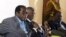 Zimbabwe's President Robert Mugabe (L) addresses the media as South Africa's President Thabo Mbeki (C) and leader of Zimbabwe's main opposition Movement for Democratic Change (MDC) Morgan Tsvangirai listen at Harare's Rainbow Towers Hotel July 21, 2008.