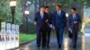 Visiting Spanish Prime Minister Pedro Sanchez, second right, chats with Chinese President Xi Jinping, left, as they tour the Diaoyutai State Guesthouse in Beijing, Sept. 9, 2024. (Xinhua via AP)