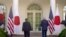 President Joe Biden and Japanese Prime Minister Yoshihide Suga leave after a news conference in the Rose Garden of the White House, April 16, 2021, in Washington.