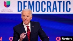 FILE - Democratic U.S. presidential candidate and former Vice President Joe Biden speaks during a Democratic candidates debate, held in CNN's Washington studios, March 15, 2020.