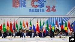 Leaders from Iran, Egypt, China, Russia, South Africa, Ethiopia and Brazil attend the BRICS Summit in Kazan, Russia, Oct. 24, 2024.