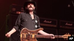 FILE - Lemmy Kilmister of the band Motörhead performs in concert during their “Bad Magic Tour 2015” at the Tower Theater, Sept. 22, 2015, in Upper Darby, Pa. 