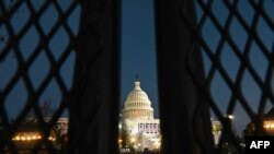 A security fence surrounds the grounds of the U.S. Capitol Building in Washington on Jan. 19, 2021, ahead of the 59th inaugural ceremony for President-elect Joe Biden and Vice President-elect Kamala Harris. 