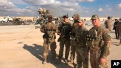 چند سرباز آمریکایی در پایگاه عین‌الاسد واقع در استان انبار عراق. (آرشیو)