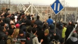 Macedonian Police Tear Gas Migrants