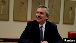 FILE - Argentinian presidential candidate Alberto Fernandez prepares to give a speech at the Parliament in Madrid, Spain, Sept. 5, 2019.