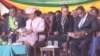 FILE: President Emmerson Mnangagwa and his wife Auxillia and vice president Constantino Chiwenga and his wife Mary follow inauguration proceedings, Aug. 26, 2018, in Harare.