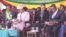 FILE: President Emmerson Mnangagwa and his wife Auxillia and vice president Constantino Chiwenga and his wife Mary follow inauguration proceedings, Aug. 26, 2018, in Harare.