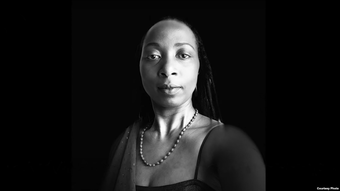 Dr. Christine Uwimana learned her biological father’s identity, and got more details about her biological mother, with help from a VOA Central Africa radio series. (Courtesy photo)