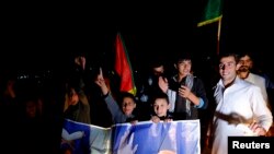 ： 2014年9月21日，阿富汗总统候选人加尼的支持者喀布尔街头庆祝加尼成为后任总统。