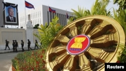 Cambodian government security forces walk in front of the Council of Ministers building as they patrol along a street ahead of the 21st ASEAN Summit and other related summits in Phnom Penh, file photo. 