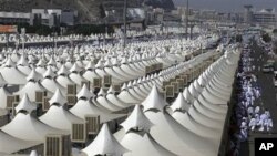 Thousands of tents housing Muslim pilgrims are crowded together in Mina near Mecca, Saudi Arabia, 14 Nov 2010. The annual Islamic pilgrimage draws 2.5 million visitors each year, making it the largest yearly gathering of people in the world.