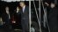 U.S. President Barack Obama waves to reporters as he and his family return to the White House in Washington, November 7, 2012.