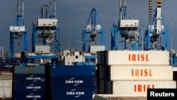 FILE - Empty and disused Islamic Republic of Iran Shipping Lines (IRISL Group) containers are seen at Malta Freeport in the Port of Marsaxlokk outside Valletta, Feb. 10, 2012. 