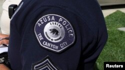 FILE - The insignia on an Azusa police officer's uniform.