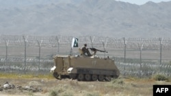 FILE - Security personnel of Pakistan's Frontier Corps stand guard in the southwestern province of Balochistan, Sept. 16, 2020. A female suicide bomber detonated herself in the province, killing at least one security personnel, police in Pakistan reported March 3, 2025.